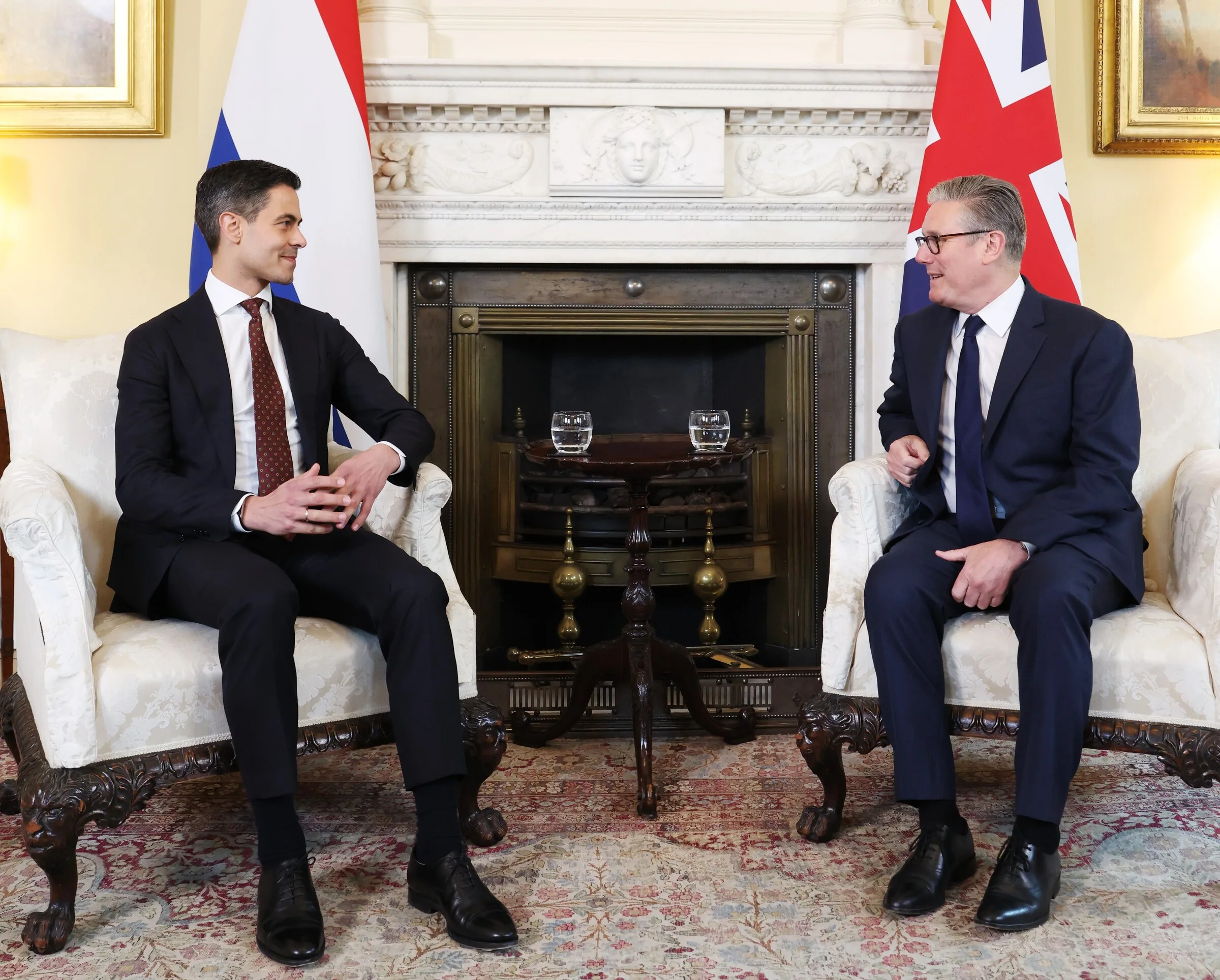 Rob Jetten and Keir Starmer seated opposite each other at 10 Downing Street