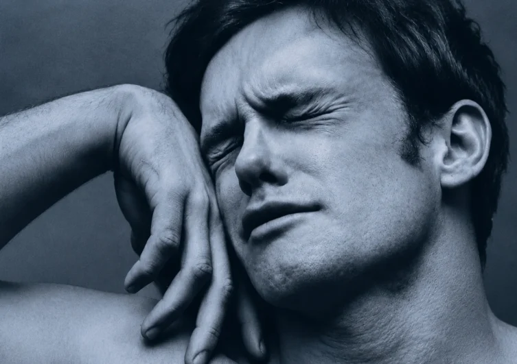 Distressed man in a blue-toned close-up for Chronicle 19’s A Little Life review